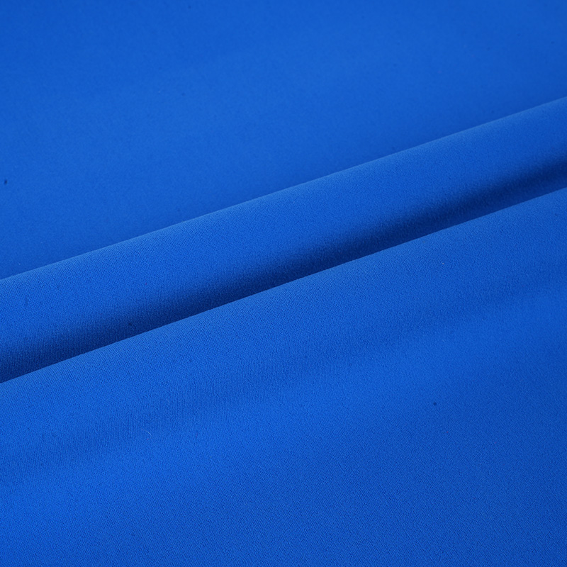 36N001 91% nylon 9% spandex elastická teplá single broskyňová bloková tkanina